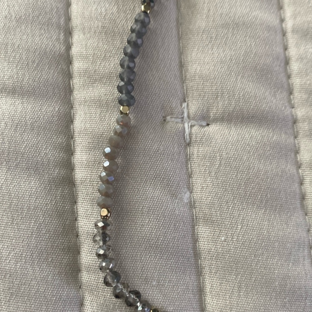Tiny beaded necklace.